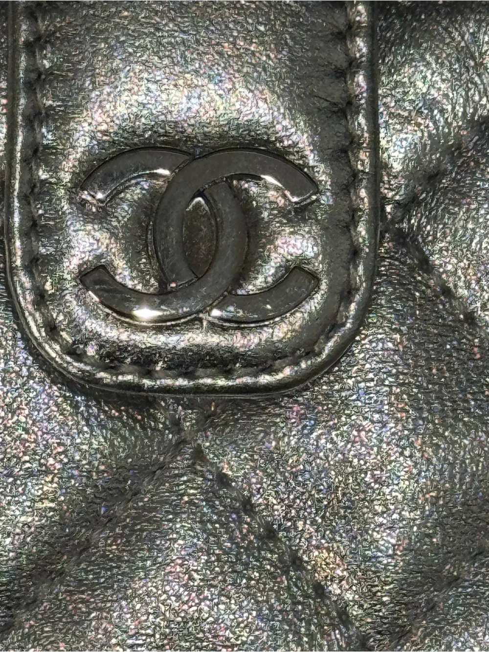 CHANEL Silver Quilted Leather O-Phone Holder with Pearl Chain.